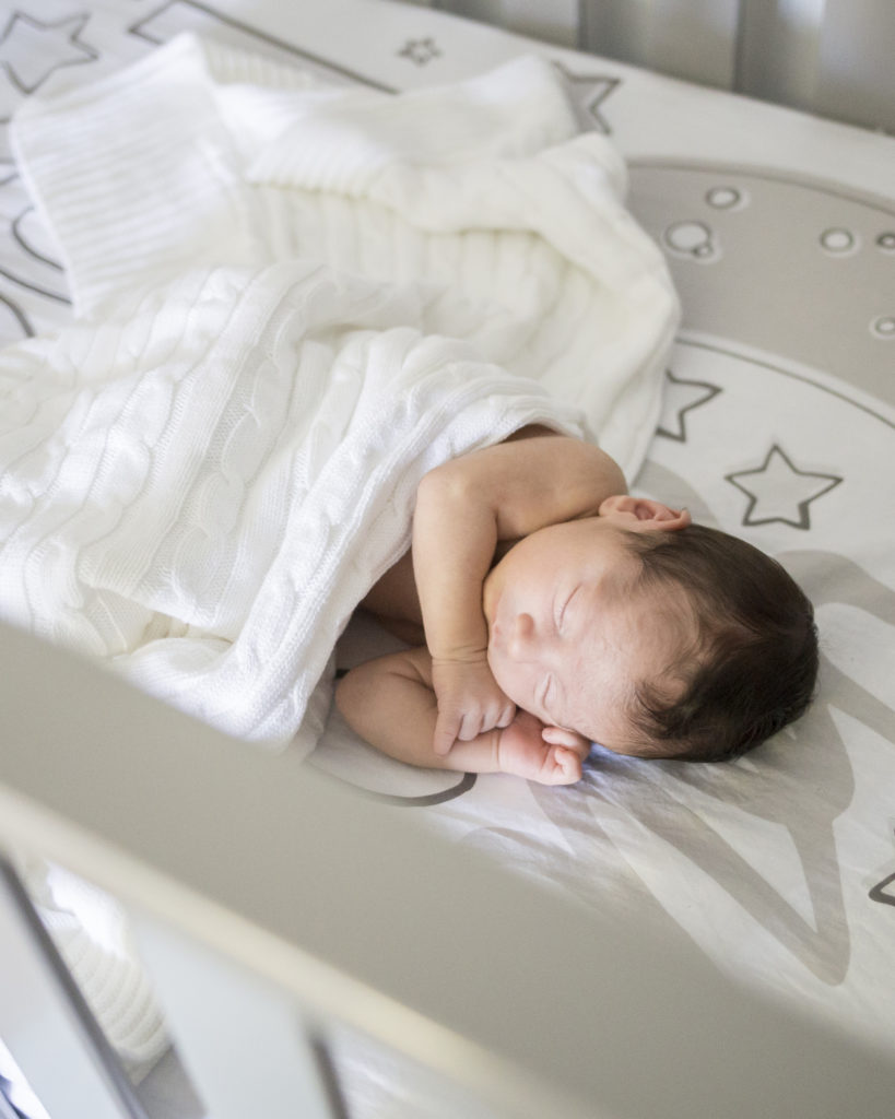 Newborn in Crib - Darling Digital Photography